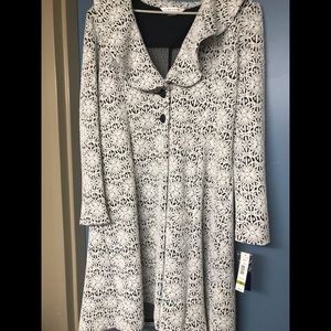 Long partnered Peter Nygard coat